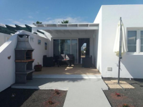 Bungalow, terraza jardín y barbacoa